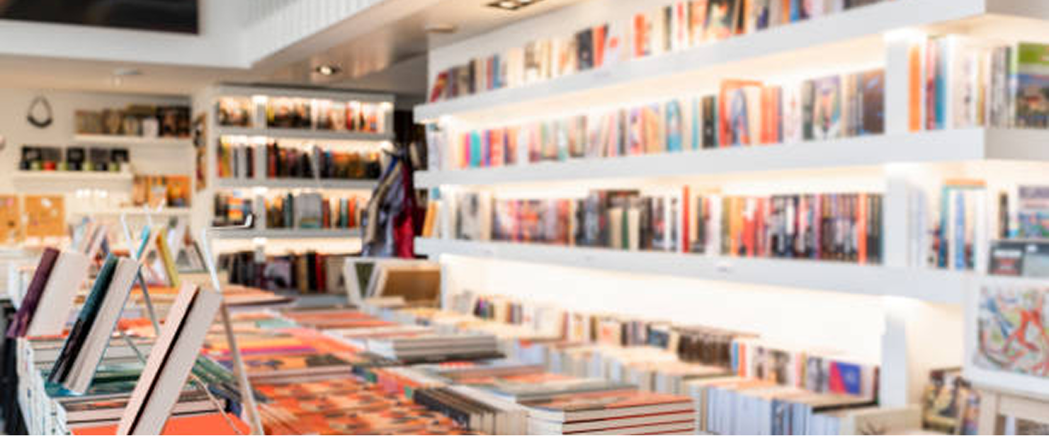 Interior of the Kinkané bookstore, shelves lined with books
